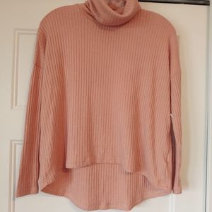 Peach cowl neck high low long sleeved top.